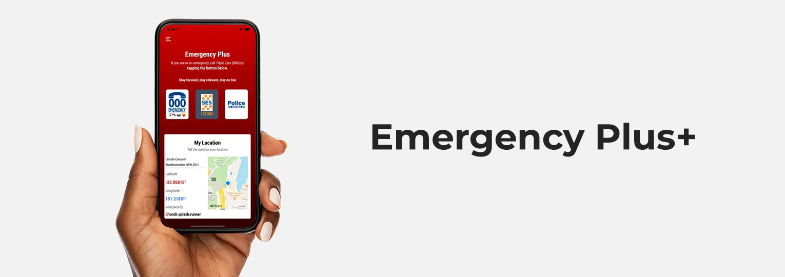 Hand holding a smartphone displaying the Emergency Plus+ app