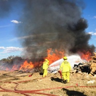 ACT Fire & Rescue firefighters working to extinguish the fire at Pialligo.