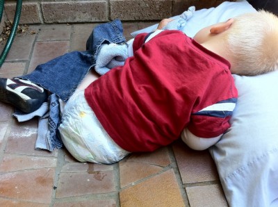 A Holder boy sleeps during his rescue from a drain pipe. Photo by ACT Fire Brigade.